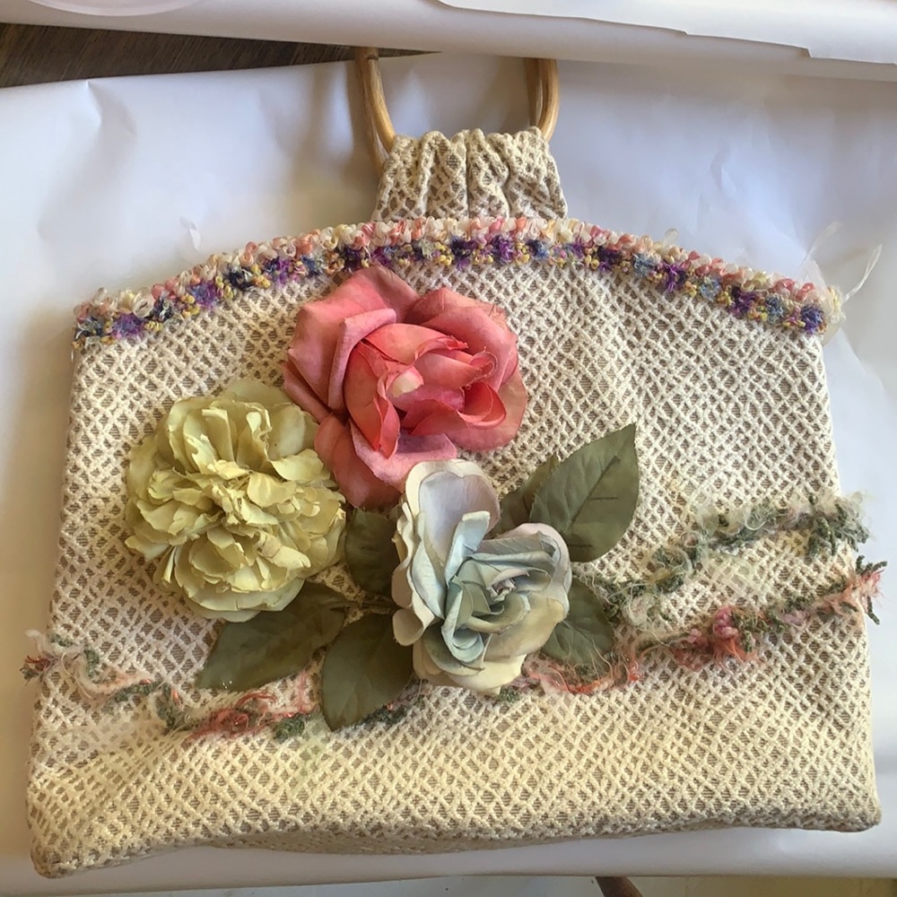 Purse with wooden handles and floral print lined